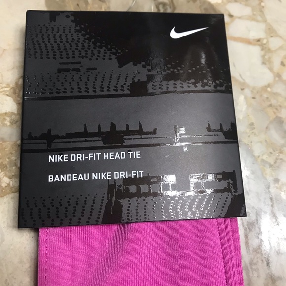Nike new head tie with white swoosh on it. - Picture 2 of 6